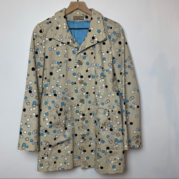 I.e. Tan trench coat with Mod circle design. - Picture 1 of 8